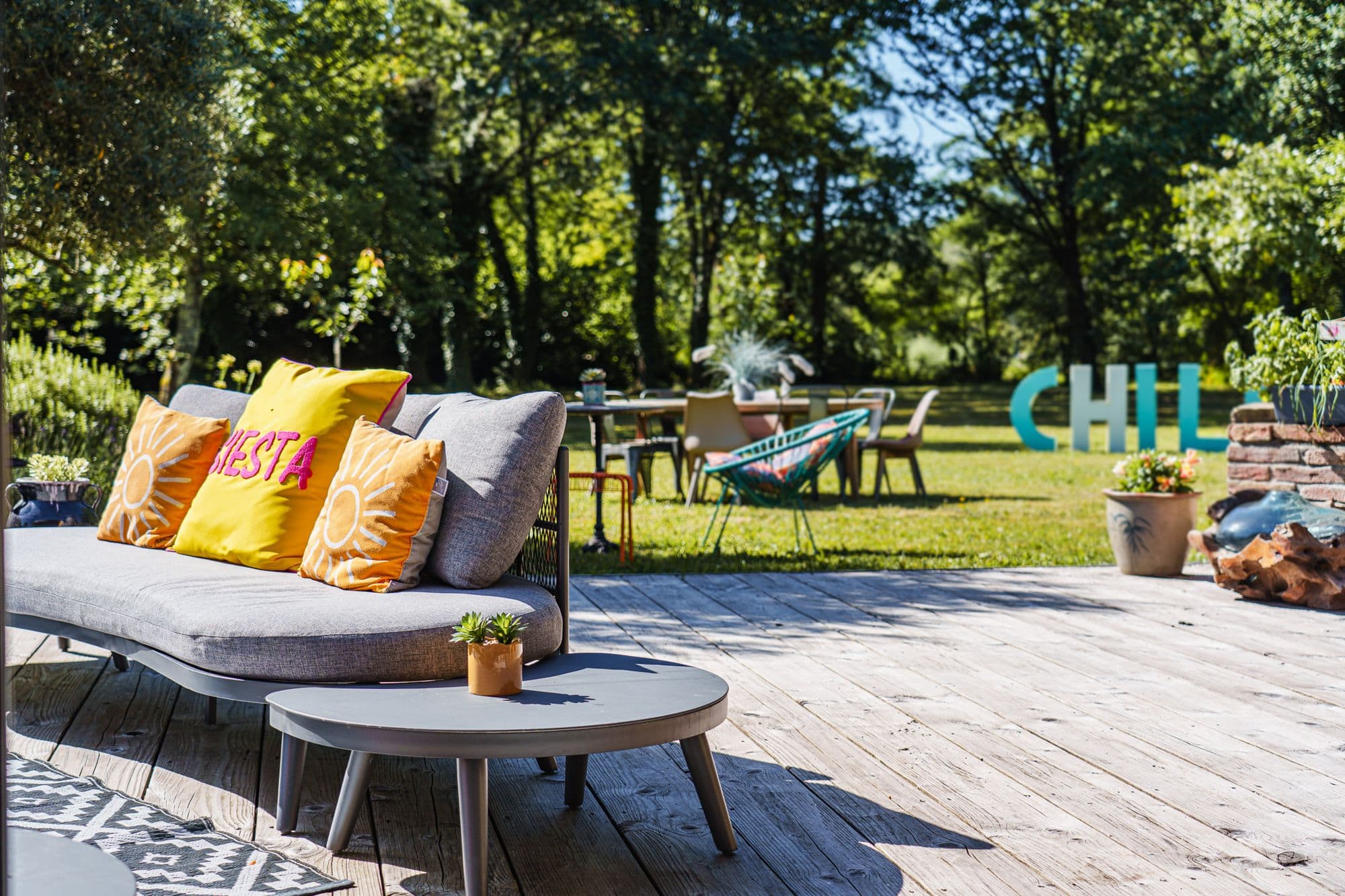 La banquette de la terrasse et ses coussins Siesta au soleil